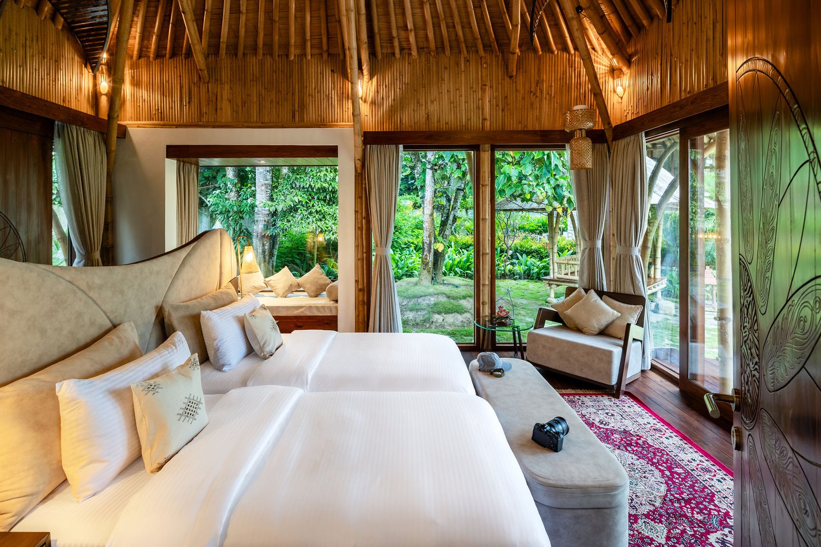 Family Pool Villa Outside view of the garden from bedroom